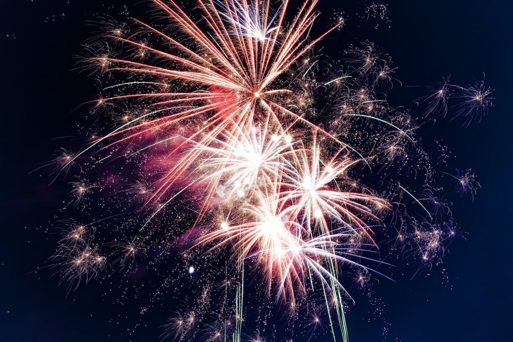 time lapse photography of fireworks at night