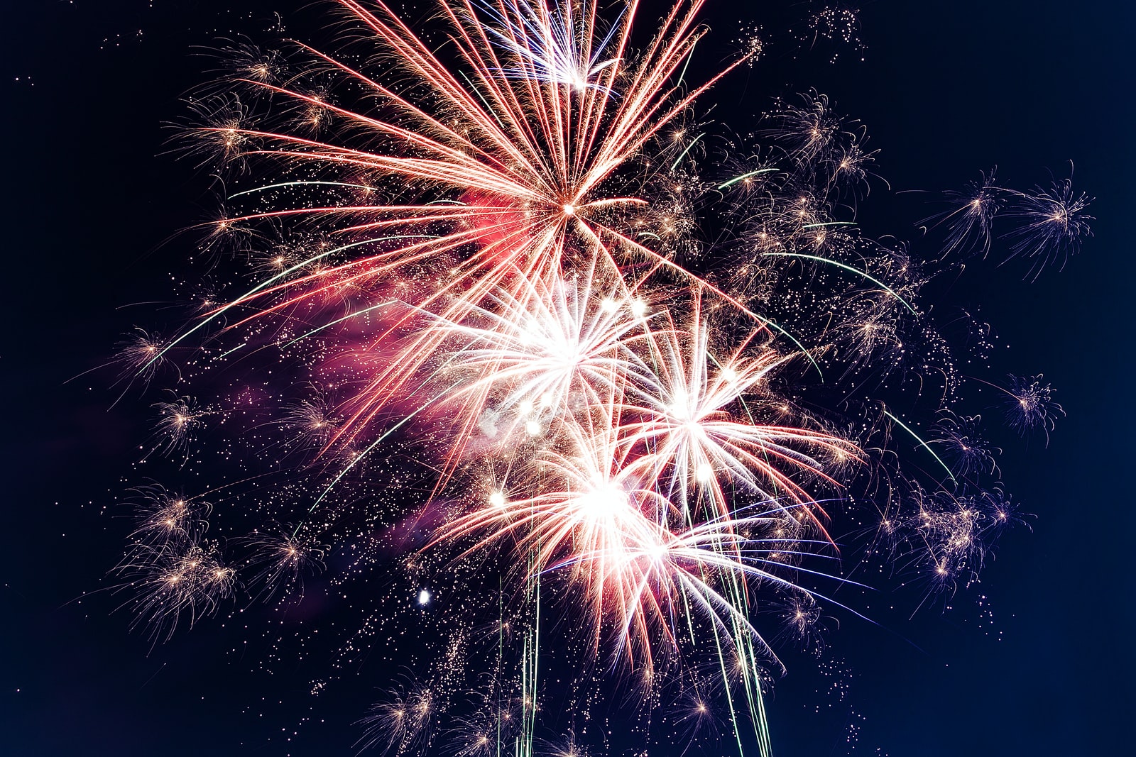 time lapse photography of fireworks at night